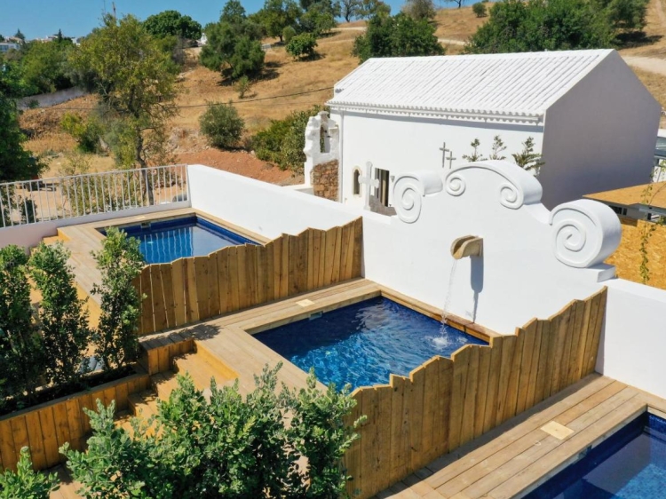pool and chapel Colégio Charm House Portugal Secretplaces Algarve best hotel in Tavira
