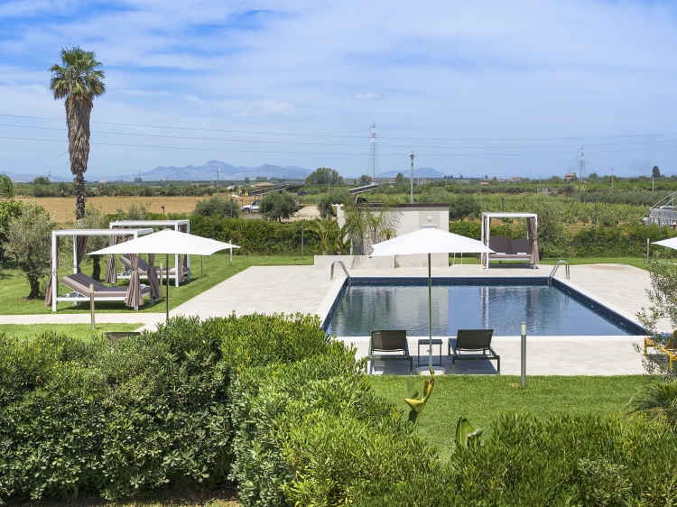 green hotel with swimming pool