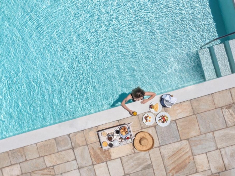 Anema Boutique Hotel in Greece Breakfast in pool santorini