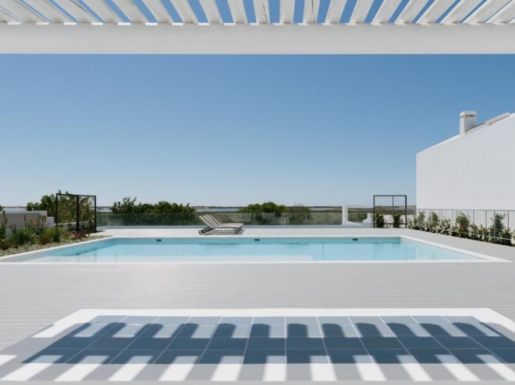 Outdoor swimming pool with garden. Salt Houses in Fuseta, Algarve, Portugal. Large luxury house. Family holidays.