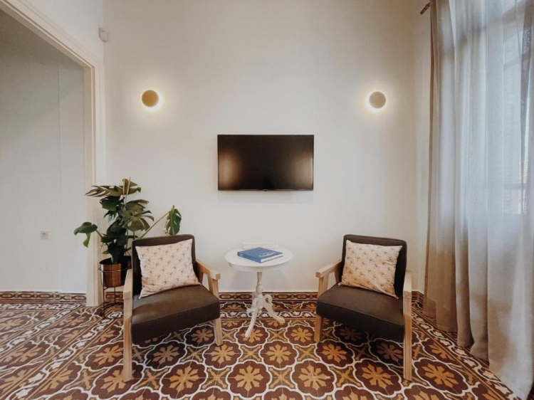 Living room, Chairs, Television, Wall-lights, Decorative tiles, Kale Kapi City in Xania