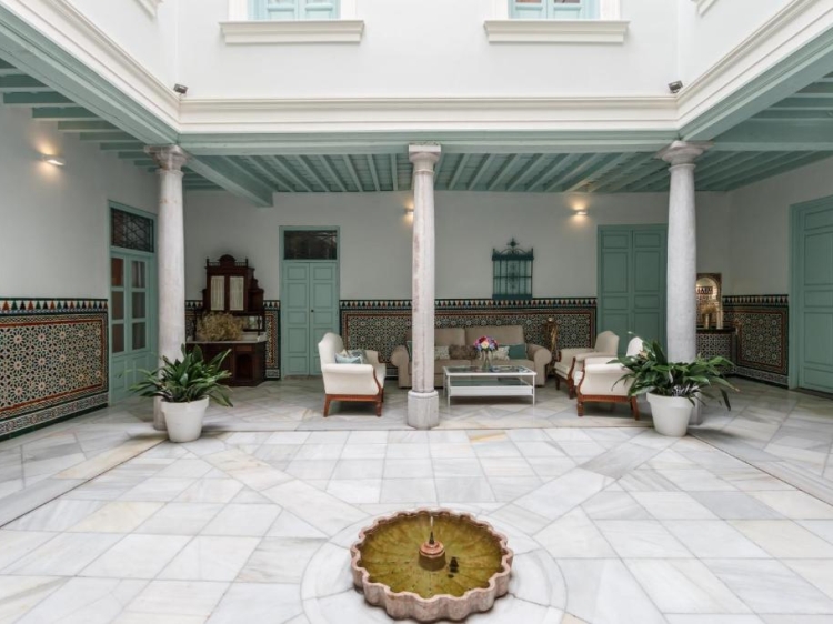 A beautifully restored 19th-century palace in the heart of Granada, offering elegant self-catering boutique apartments — perfect for families or a romantic stay.