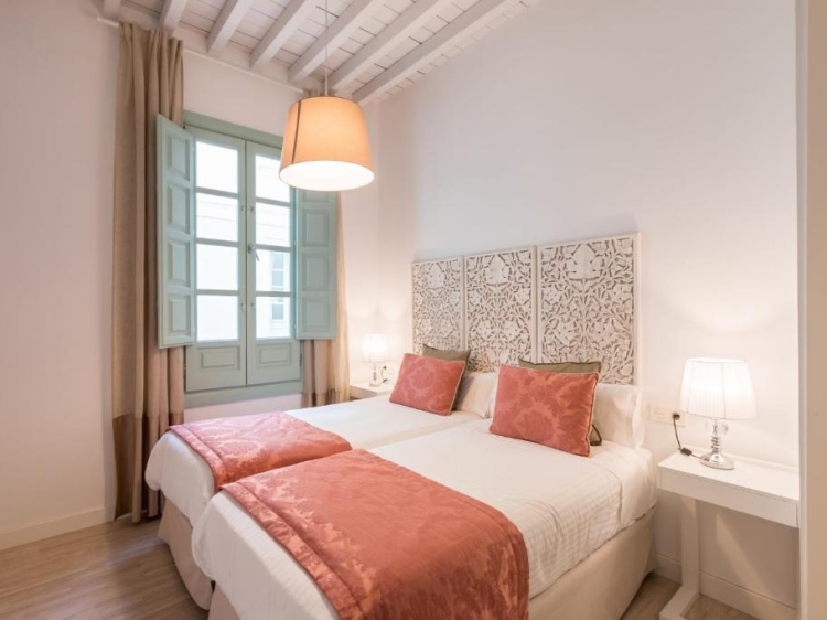 A beautifully restored 19th-century palace in the heart of Granada, offering elegant self-catering boutique apartments — perfect for families or a romantic stay.