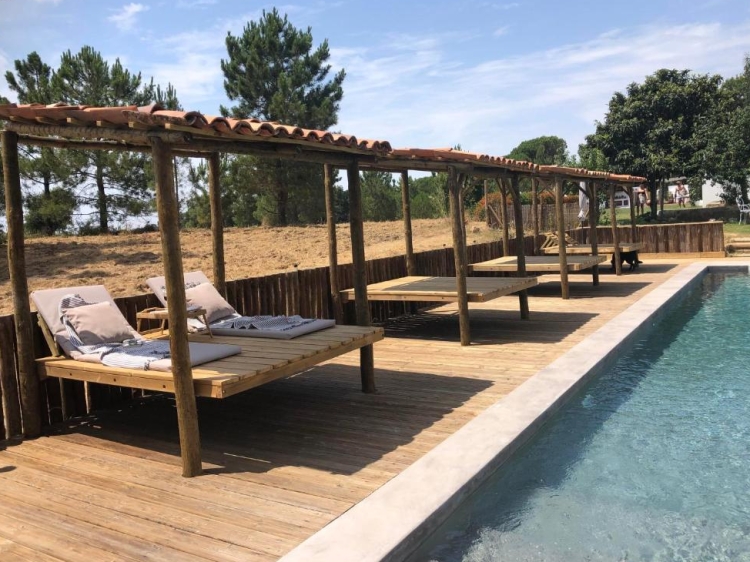 Pool with sun loungers