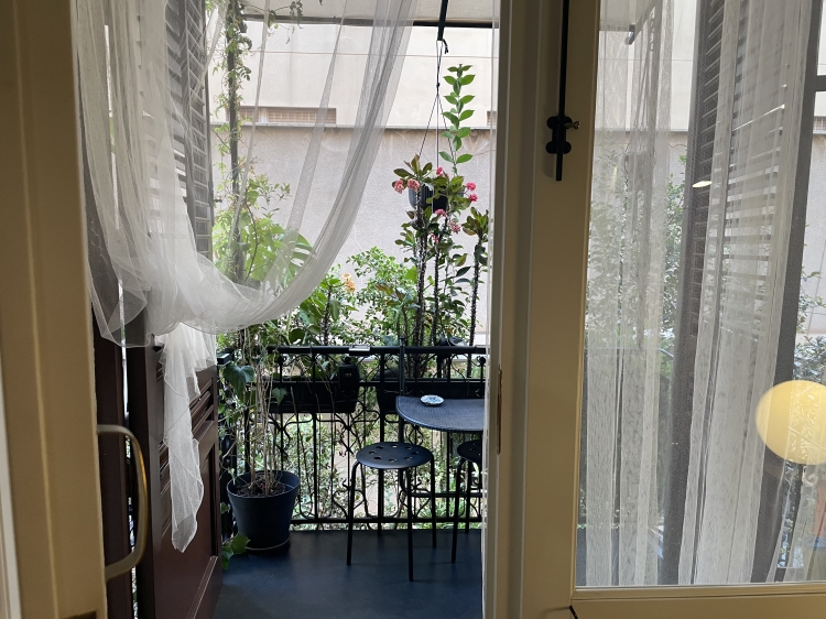 boutique apartment inside an Art Nouveau palazzo in Palermo. With original flooring, private patio and considered design, it sits in the elegant Libertà district, just 15 minutes on foot from the historic centre. A discreet urban base with character.