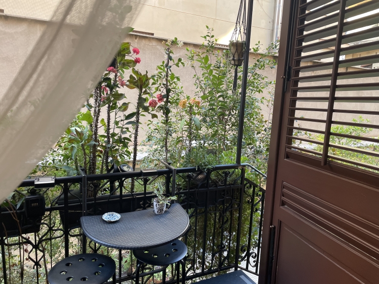 boutique apartment inside an Art Nouveau palazzo in Palermo. With original flooring, private patio and considered design, it sits in the elegant Libertà district, just 15 minutes on foot from the historic centre. A discreet urban base with character.