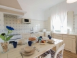 Casa do Caseiro kitchen & living room with fireplace costa vicentina zambujeiro do mar