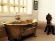 Gold bath tube in the Berber Suite