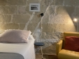 Marès wall in double room 