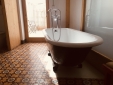 Bathtub in room 5 with terrace