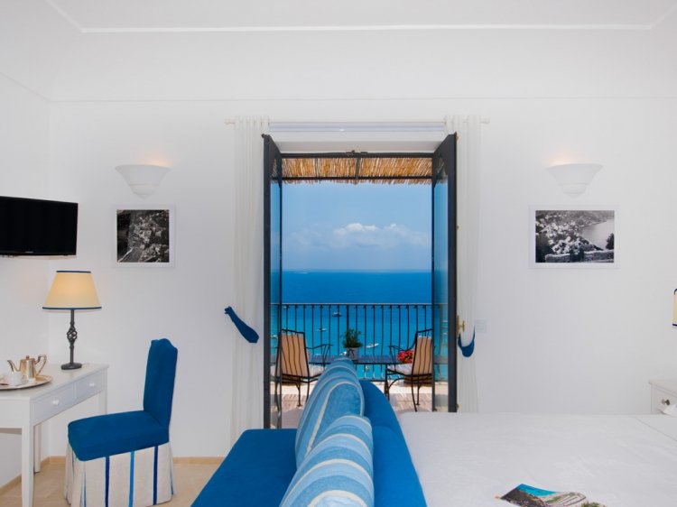 Interiro and balcony of Albergo Miramare