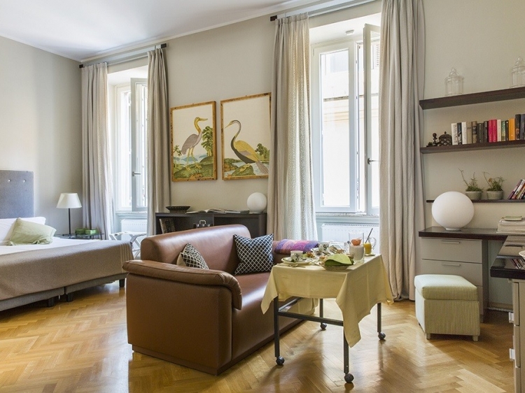 Elegant living area of Navona My Home, Rome